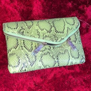 Lime green and black snake print bag